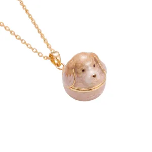 Exquisite gold-plated chain with cute enamel puppy locket pendant, fine detail jewelry view.