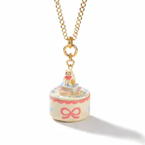 Cute enamel cat book box pendant necklace for women, stylish gold plated jewelry gift.