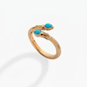 Anillo de serpiente de acero inoxidable bañado en oro con piedras turquesas para mujer.