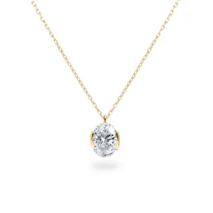 Elegant oval pendant necklace with sparkling stone and delicate gold chain for women.