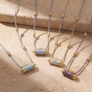 Animal series prayer wheel braided rope necklace with enamel cylinder pendants for women.