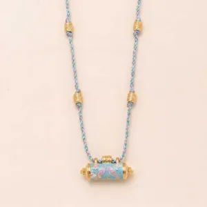 Fashion enamel prayer wheel pendant braided rope necklace with gold plated beads.