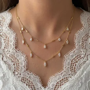 18k vergulde roestvrijstalen dubbellaagse ketting met kubieke zirkonia druppelhangers.
