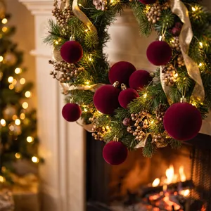 Burgundy velvet Christmas balls and wreath detail, premium holiday home decor and tree ornaments.