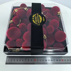 Detail view of wine red velvet Christmas balls set, 44 pieces boxed holiday hanging decor.