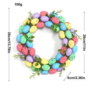Easter egg wreath with colorful speckled eggs and green leaves, perfect for home party wall decor.