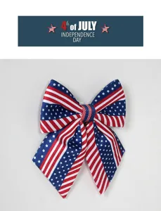 American Independence Day themed fabric bow ornament with classic stars and stripes pattern.