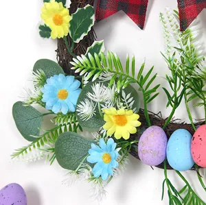 Easter wreath detail shot featuring colorful eggs, daisies, and a plaid bow for home decor.
