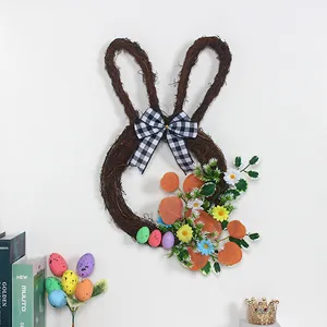 Easter bunny twig wreath wall hanging home decor with eggs and plaid bow detail view.