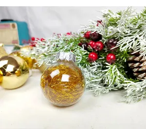 Clear plastic Christmas ball filled with gold tinsel, 6cm hanging tree decoration pendant.
