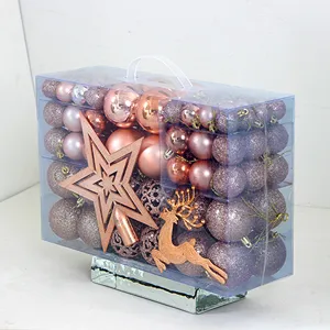 Details zum 102tlg. roségoldenen Christbaumkugeln Set mit Baumspitze und PVC-Box Verpackung.