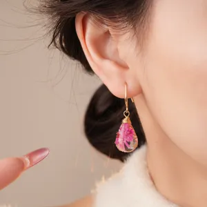 Bohemian resin flower teardrop earrings with gold wire wrap, elegant floral jewelry for women.