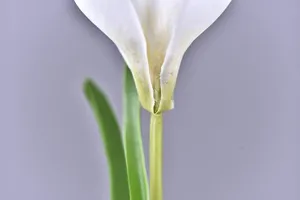 Close-up detail view of artificial flower petal texture and stem design for decor.