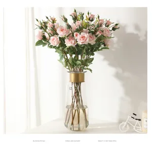 Artificial pink rose bouquet with glass vase for home decor, wedding and party decoration.