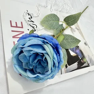 Close-up detail of a blue artificial Austin rose flower decoration for home decor.