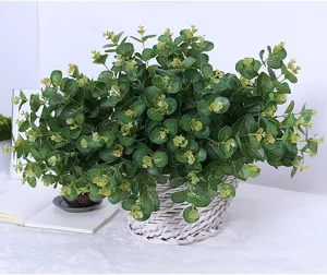 Artificial eucalyptus potted plant green foliage detail shot for indoor home decor display.