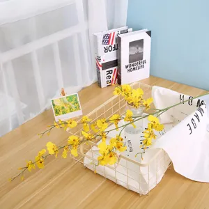 Yellow artificial dancing orchid branch silk flower for home wedding decor and tabletop display.