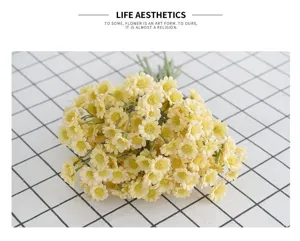 Artificial yellow chamomile flower bouquet for home decoration and photography props.