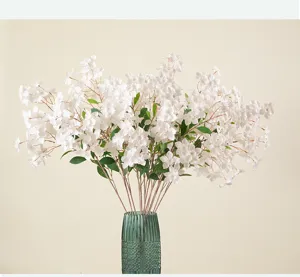 Künstliche Oncidium Tanzorchidee Blumenstrauß in grüner Glasvase für Heimhochzeit Deko.
