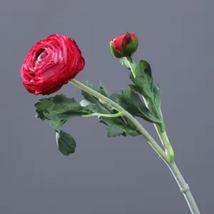 Detailed view of artificial red ranunculus flower, featuring single stem with open bloom and bud.