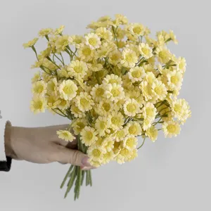 Artificial yellow daisy flower bunch, cute chamomile fake floral bouquet for home decor and props.