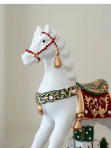 Close-up detail view of the exquisite white resin Christmas rocking horse desktop ornament.
