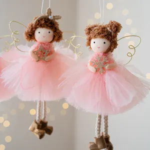 Christmas pink angel doll hanging ornament with gold wings and tulle dress for tree decor.