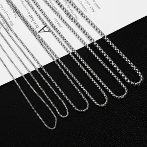 Stainless steel box chain closeup display, multi-size silver metal necklace chains for daily wear.