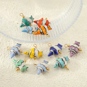 Ceramic tropical fish pendant charms detail shot for DIY bracelet and necklace making.