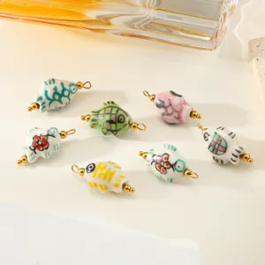 Dije de pez de ceramica hecho a mano con aros de acero, accesorios bonitos para bisuteria DIY.