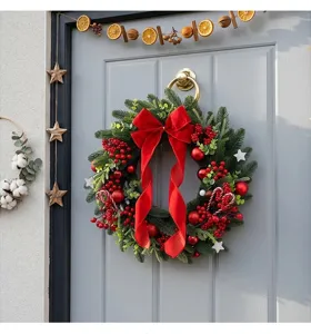 Couronne de Noël avec nœud rouge et baies de pin artificielles décoration de porte de vacances