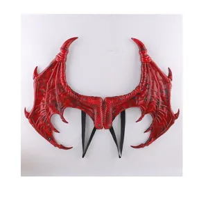 Red dragon wings detail showing realistic textured surface and elastic strap for kids Halloween party.