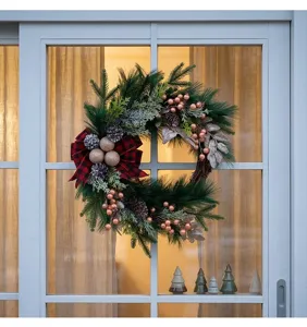 Christmas wreath with red black plaid bow pine branches pinecones berries door hanging decor