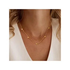 Minimalist gold heart station necklace, elegant clavicle chain for modern daily fashion wear.