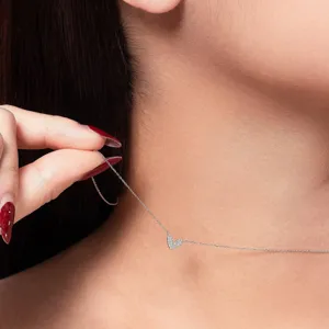 Dainty silver-tone chain necklace featuring a sparkling pavé zirconia heart pendant for women.