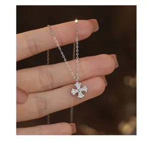 Delicate S925 silver pavé cross pendant necklace, stunning detail shot, chic jewelry.