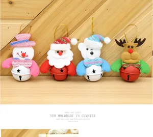 Detailed view of Christmas plush doll bell pendants, featuring cute holiday characters.