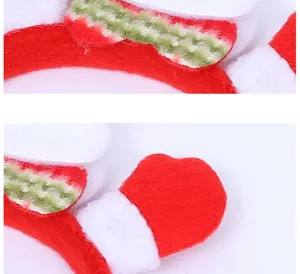 Christmas headband detail view, red and white plush hair hoop with cute holiday design.