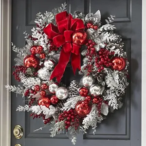 Christmas wreath for front door, frosted pine with red velvet bow and berries decor