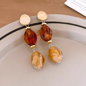 Chic amber acrylic beaded drop earrings for women, stylish geometric metal fashion jewelry.