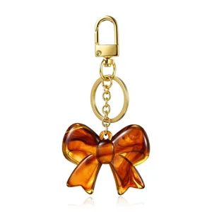 Llavero de Lazo de Resina Ámbar Vintage Colgante Moda Chapado en Oro Aleación Dije Llavero Delicado Adorno de Bolso para Mujer