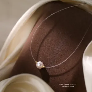 Sterling zilveren parel onzichtbare vislijn ketting, minimalistische elegante accessoire.