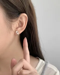 Sterling silver star pearl stud earrings for women, minimalist chic daily jewelry accessory.