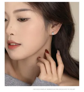 Elegante 999 Silber Schlangen Zirkon Ohrringe für Damen, minimalistischer Modeschmuck.