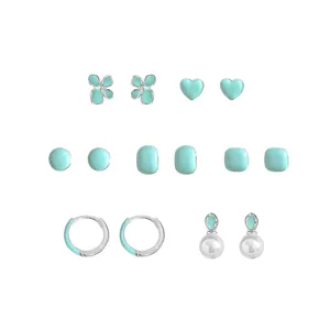 Mint green enamel earring set featuring various designs like hearts, flowers, and hoops.