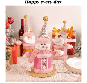 Close-up details of pink Christmas plush candy jar packaging box with cute snowman and reindeer.
