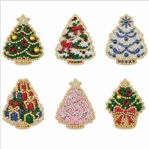 Detailed view of 6-piece set DIY diamond painting Christmas tree fridge magnets.