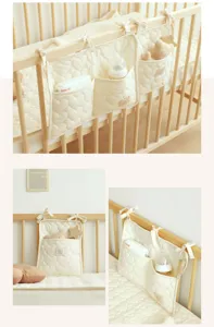 Detailansicht eines cremefarbenen, gesteppten Babybett-Organizers an Holzgittern