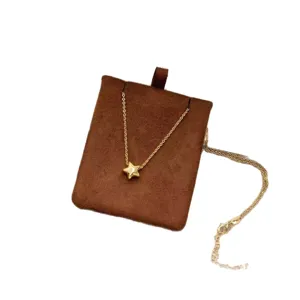Collar minimalista con colgante de estrella de la suerte bañado en oro de 24K para mujer