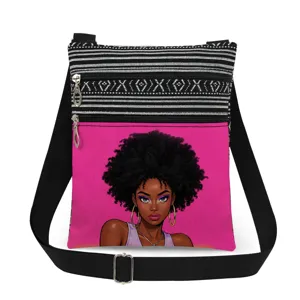 Detailed view of the crossbody bag featuring black and white striped trim and bold graphic print.